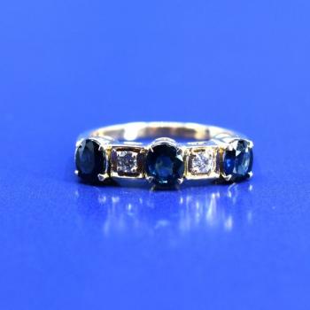 Gold ring with sapphires and diamond Gold ring with sapphires and diamond
