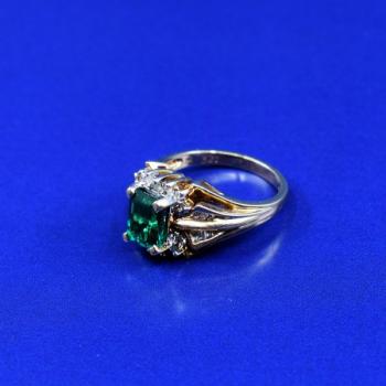 Gold ring with green stone Gold ring with green stone