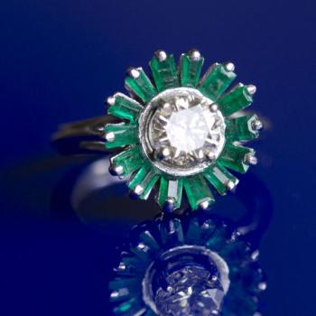 Platinum ring with diamond and emeralds Platinum ring with diamond and emeralds