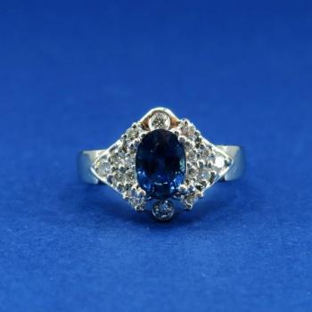 Platinum ring with diamonds and saphire